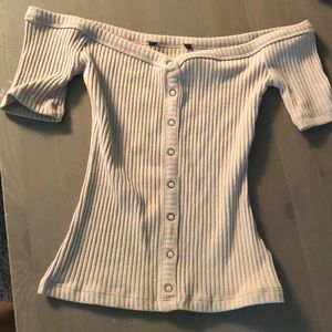 Off the shoulder cream colored top